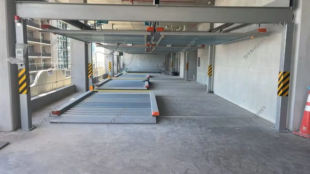 2-Grid Tandem PSH Puzzle Parking System for Narrow L-Shaped Sites