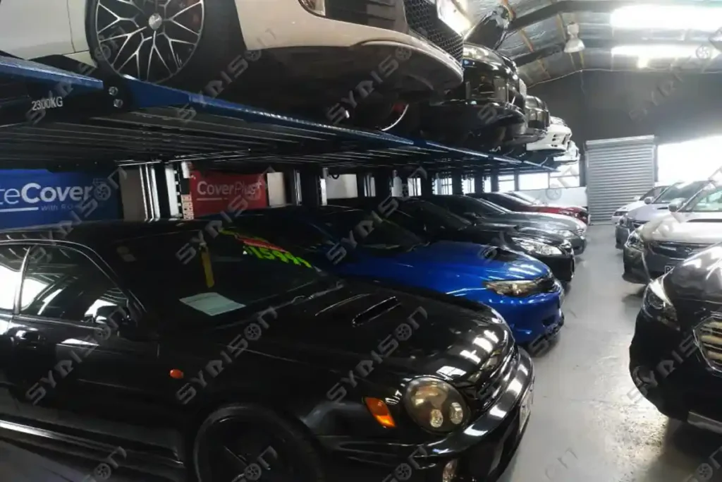 Custom blue TPP105 2-post car stacker parking lift with 2.3-ton capacity for indoor vehicle storage in New Zealand.